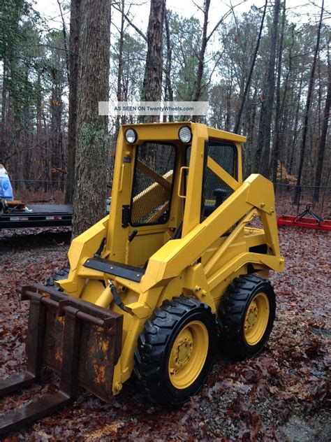 skid steer loader john deere 575 the arms|john deere 575 specs.